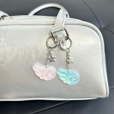 Moderne Doppelt-Charm-Schlüsselkette Mit Sternenflügel Und Sternmotiv Weiche Haptik Harz Perfekt Für Schlüsselorganisation