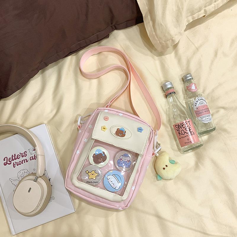Japanese ins casual girl small bag, versatile messenger bag, cute transparent and painful bag, grain bag, mobile phone bag.