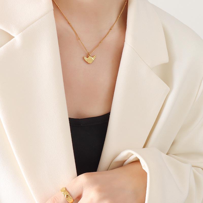 Gold-Plated Geometric Wing Pendant Necklace: Japanese-Korean Design with Titanium Steel Clavicle Chain