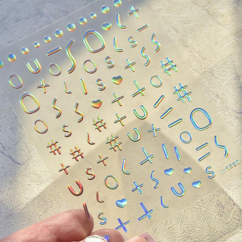 

Hot Bronzing Silver Nail Sticker Tomoni Laser Letter Symbols Laser Silver 1390