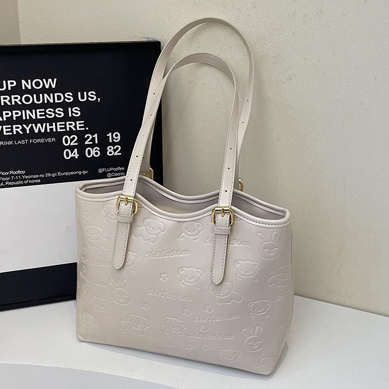 Spring and summer new casual Korean version cute embossed simple wind tote bag large capacity fashionable commuter shoulder women's bag