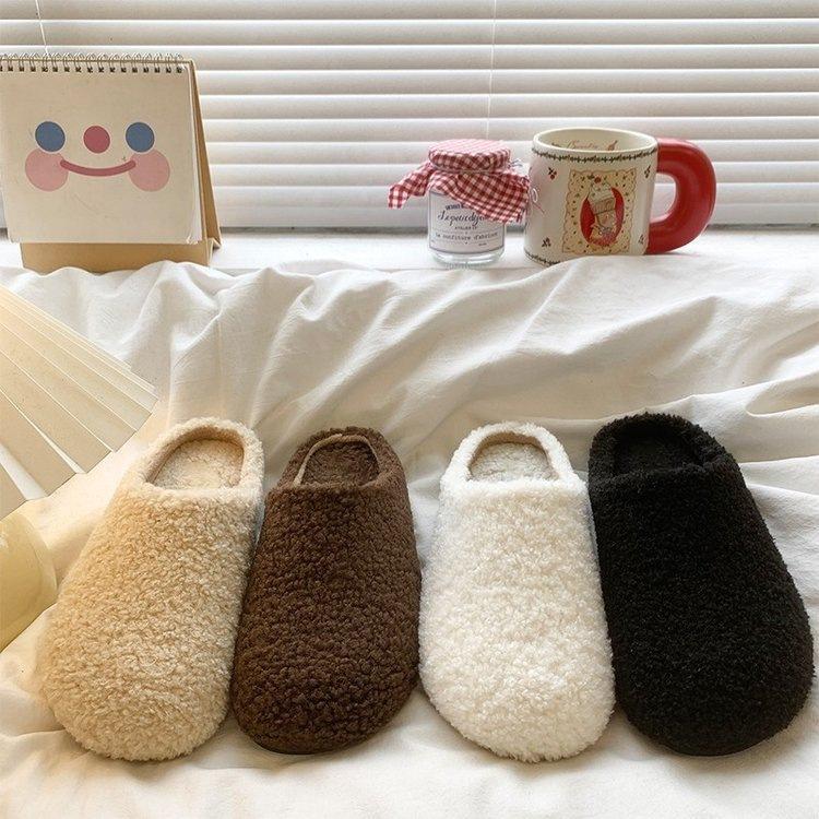 Zapatos blancos peludos zapatos de mujer cabeza de bolsa de fondo plano zapatillas de media caña uso otoño e invierno cálidos zapatillas de algodón peludo arrastre modelos de mujer