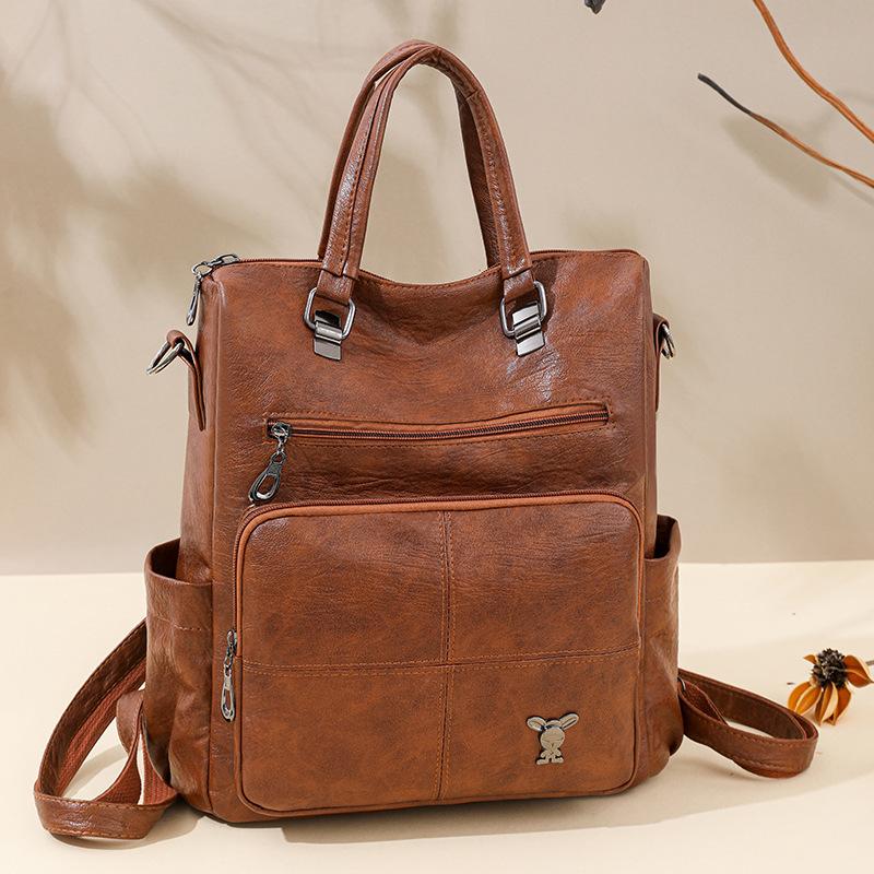 

Multifunctional soft leather backpack women s new trendy women s bag large capacity simple casual women s backpack коричневый