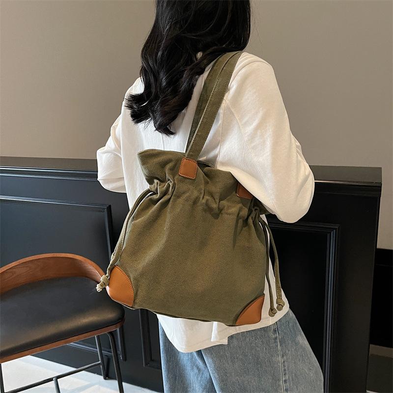 Casual Lazy Wind Simple Capacity Canvas Bag Women 2025 New Simple Korean Version Versatile Shoulder Bucket Bag