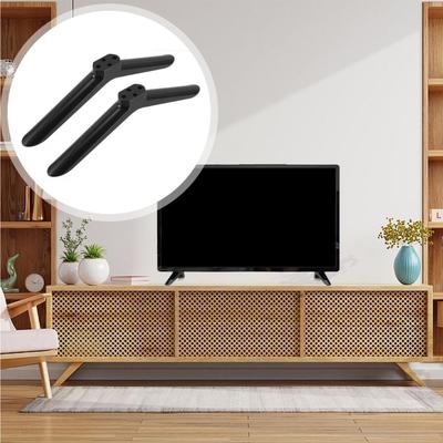 Universaalne teleri aluse jalad libisemiskindlate patjadega kruvidega, teleri aluse kinnitus, must televiisor, lauapealne jalg, magamistuba