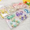 Handmade candy-colored bow bead pendant phone case chain for female students - beaded hand-held jewelry and bag accessory.