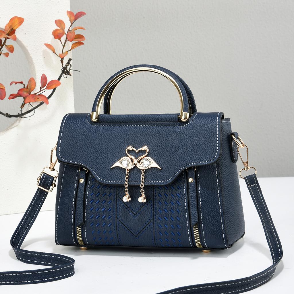 The Lady Is Carrying A Sweet Single-shoulder Bag with A Large Capacity for Daily Commuting, A Crossbody Bag.