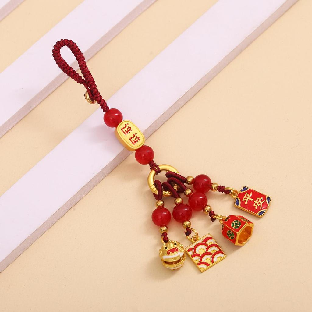 Goldener Glücksschlüsselanhänger: Reichtumsgott verschlingt Goldtier für Familie, perfekt als Auto- oder Handyanhänger.