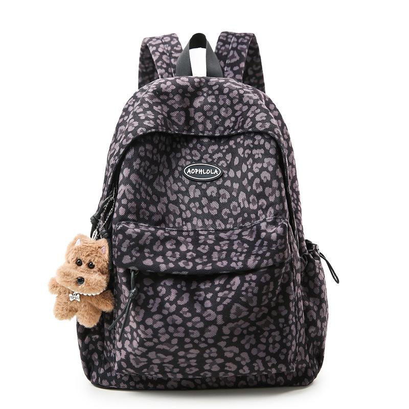SchoolbagYX high-value leopard print backpack female college student daily commuter backpack high school junior high school large-capacity schoolbag