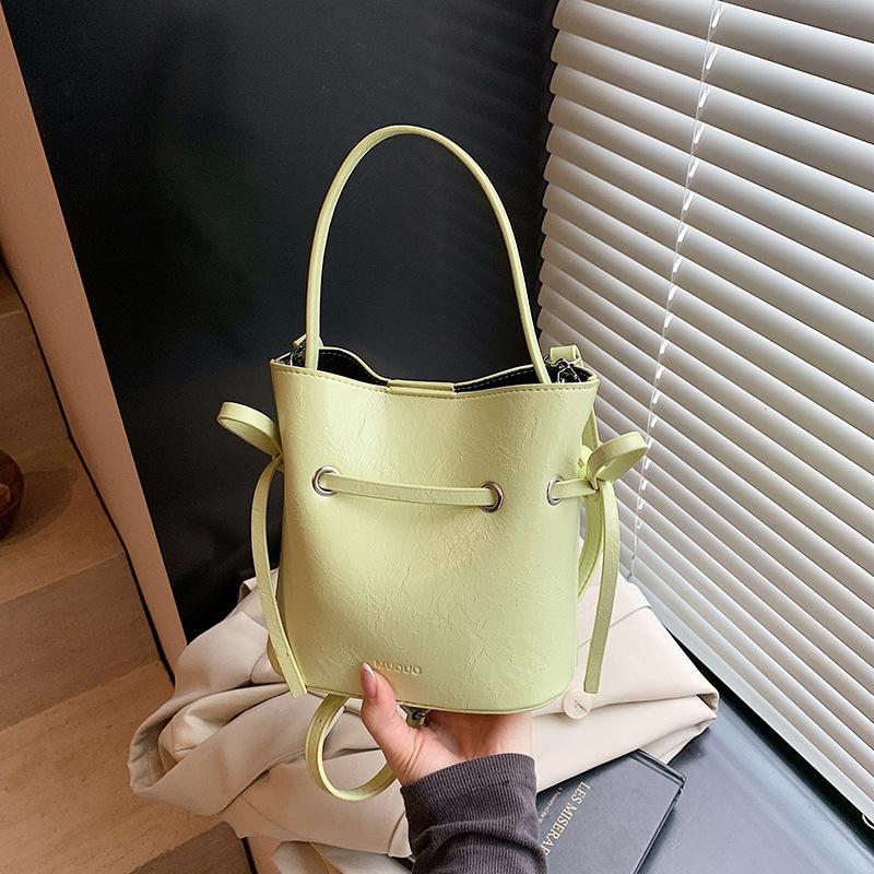 Handbag bag women's spring and summer new fashion small fresh simple bucket bag retro shoulder messenger bag