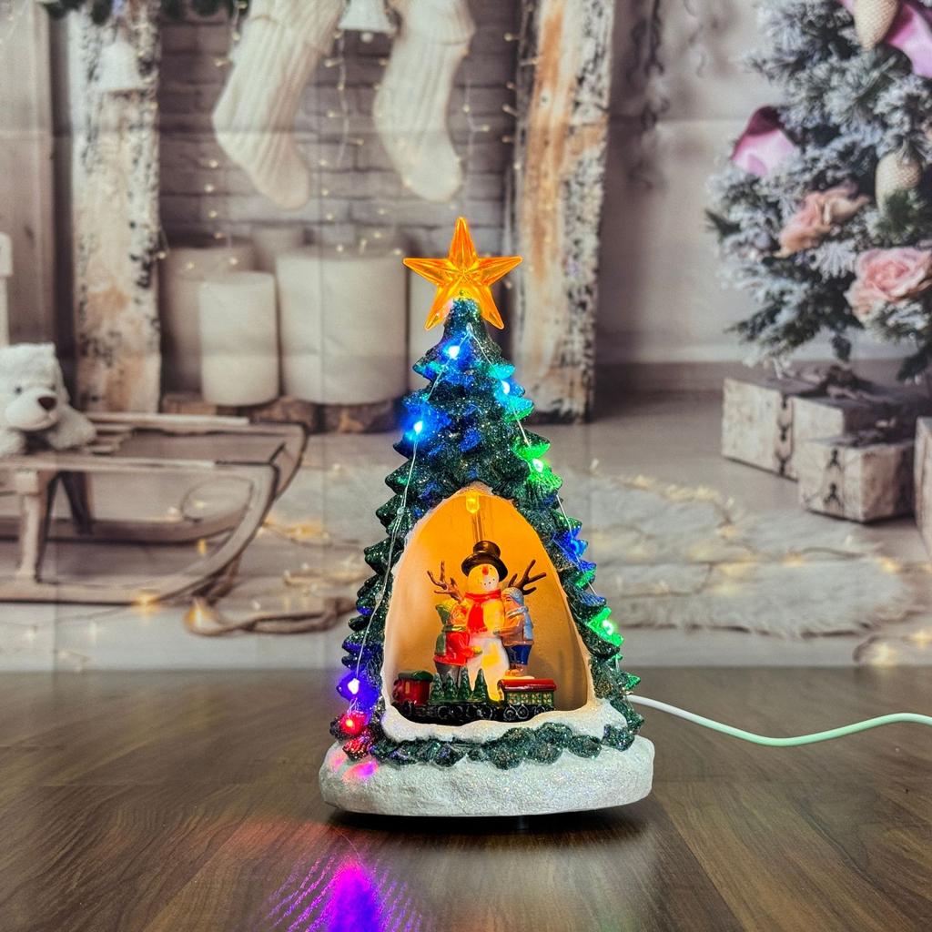 Juldekorationer, glödande musik, julgransbordsdekorationer, snöhusspeldosor, julklappar