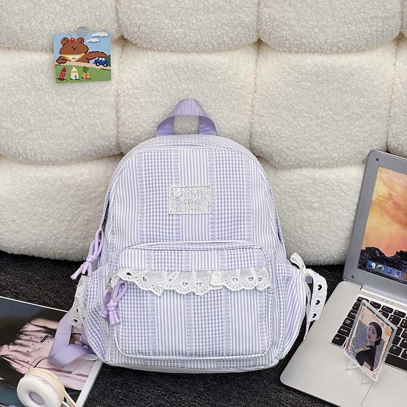 Simple casual striped schoolbag Female junior high school student backpack Large capacity class commuter travel backpack