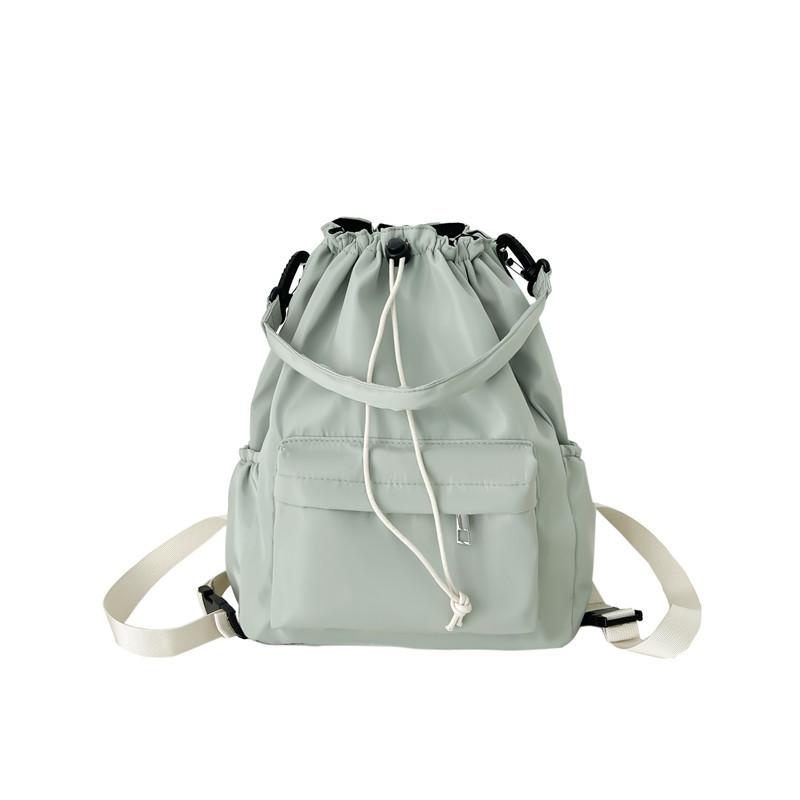Daily versatile student schoolbag new niche design drawstring bundle shoulder bag simple commuter backpack women