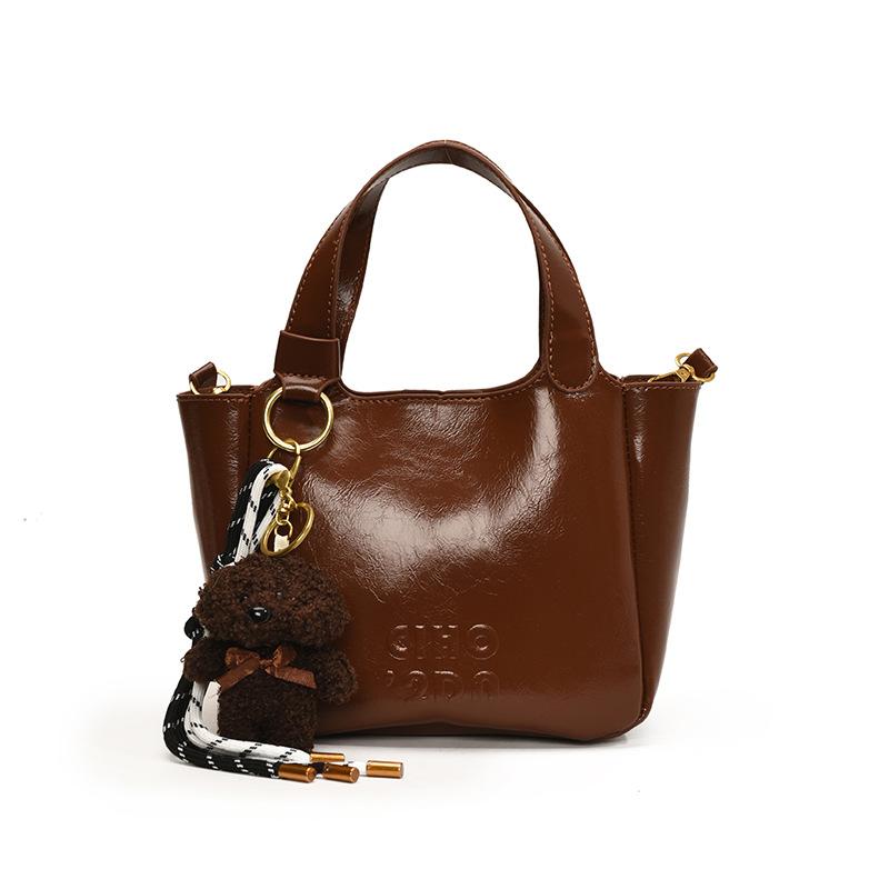 Autumn and Winter Popular Fashionable Korean Niche Simple Portable Bucket Bag Women's Versatile Commuter Senior Sense Messenger Bag