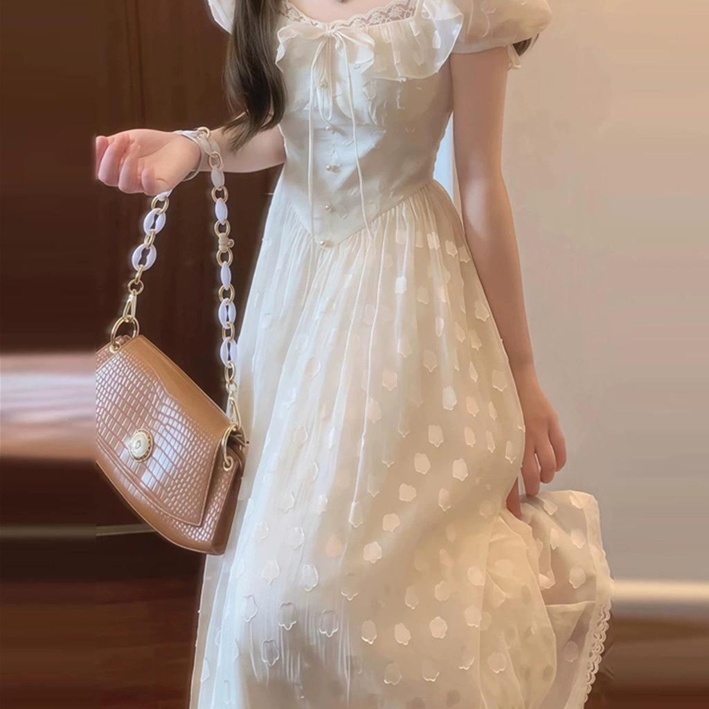 French bubble sleeve white dress women's summer new high-end temperament seaside vacation fairy long dress