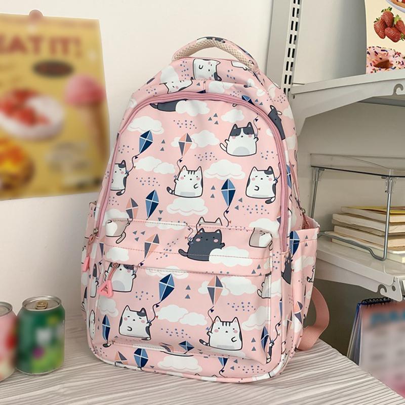 

Новый мультяшный рюкзак с принтом кота, большой вместимости, многослойный, легкий, с защитой спины, водонепроницаемый школьный рюкзак, повседневный рюкзак-джокер розовый