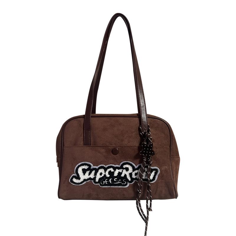 

Autumn and winter casual versatile commuting niche cute doll bag female students class large capacity messenger bag