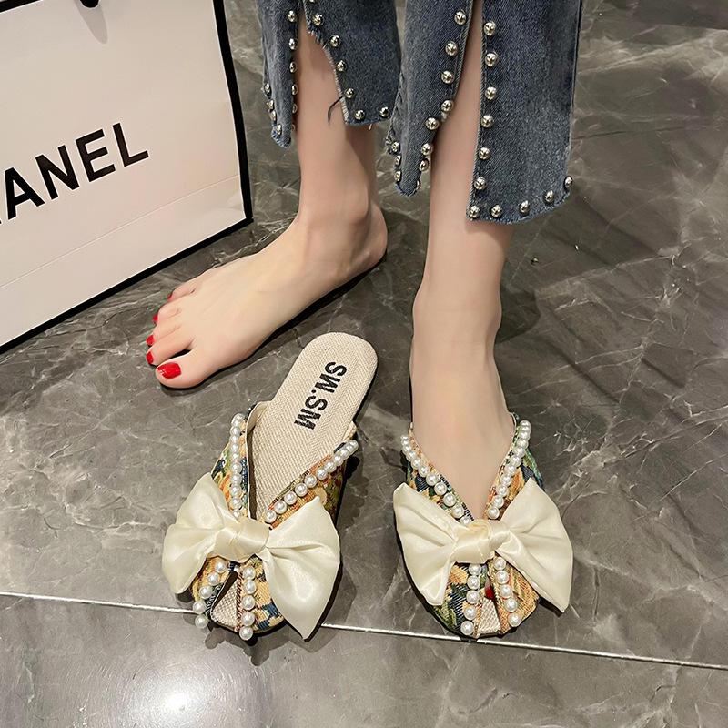 Small floral sandals bag head half slippers women's summer wear New Year's new bow pearl flat bottom fish mouth Muller