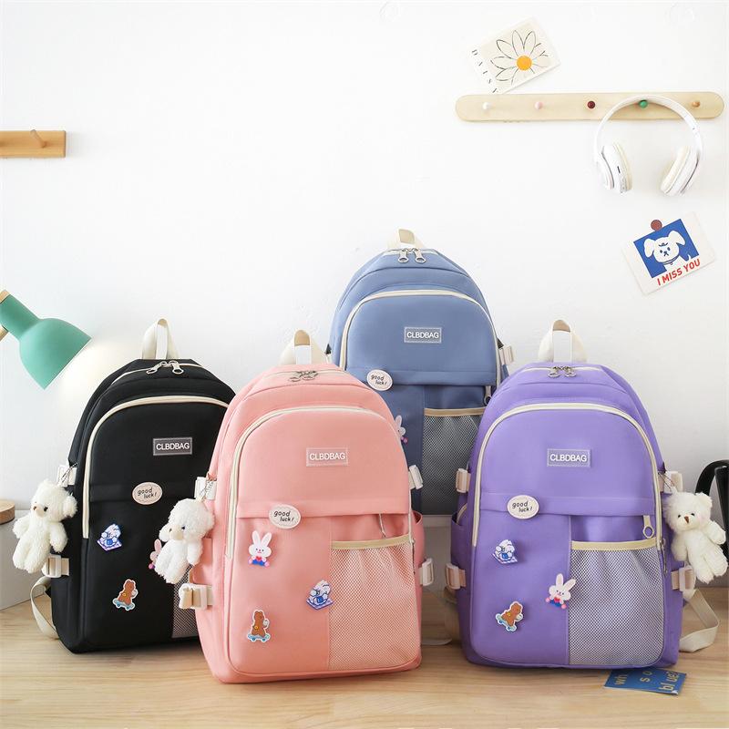 Schoolbag four-piece leisure student schoolbag 1011 new large-capacity class tutoring bag portable schoolbag backpack