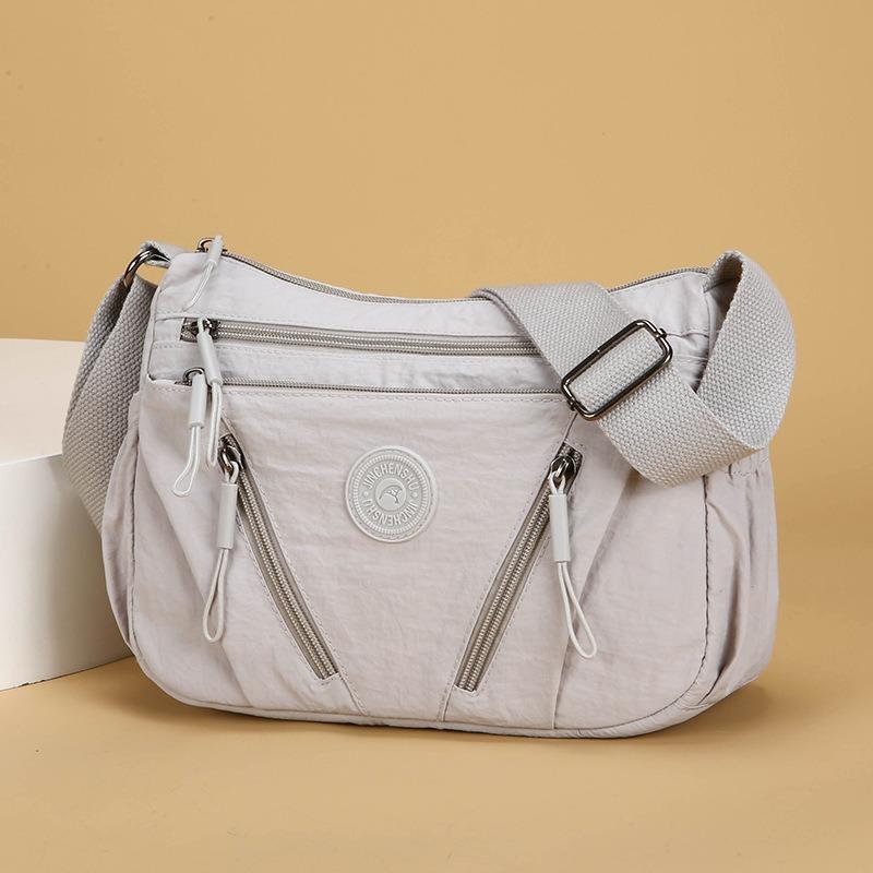 Mehrschichtige lässige und leichte Umhängetasche mit einem Riemen, Damenmode, schlicht und vielseitig, mehrere Fächer, Pendler-Mittelalter-Muttertasche