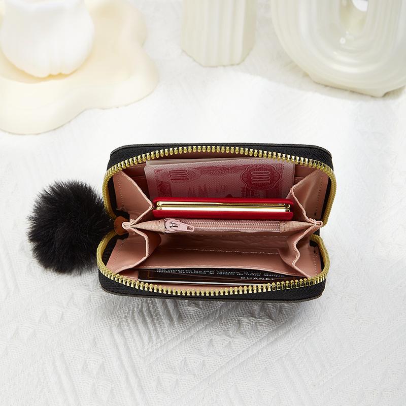 New single zipper multi-functional short women's change bag fashionable and simple hairball decorative wallet