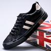Neue Herrenschuhe für den Frühling Elastische Riemen Vielseitig Atmungsaktiv Board-Schuhe Herren Freizeitschuhe Low Top Flache Schuhe