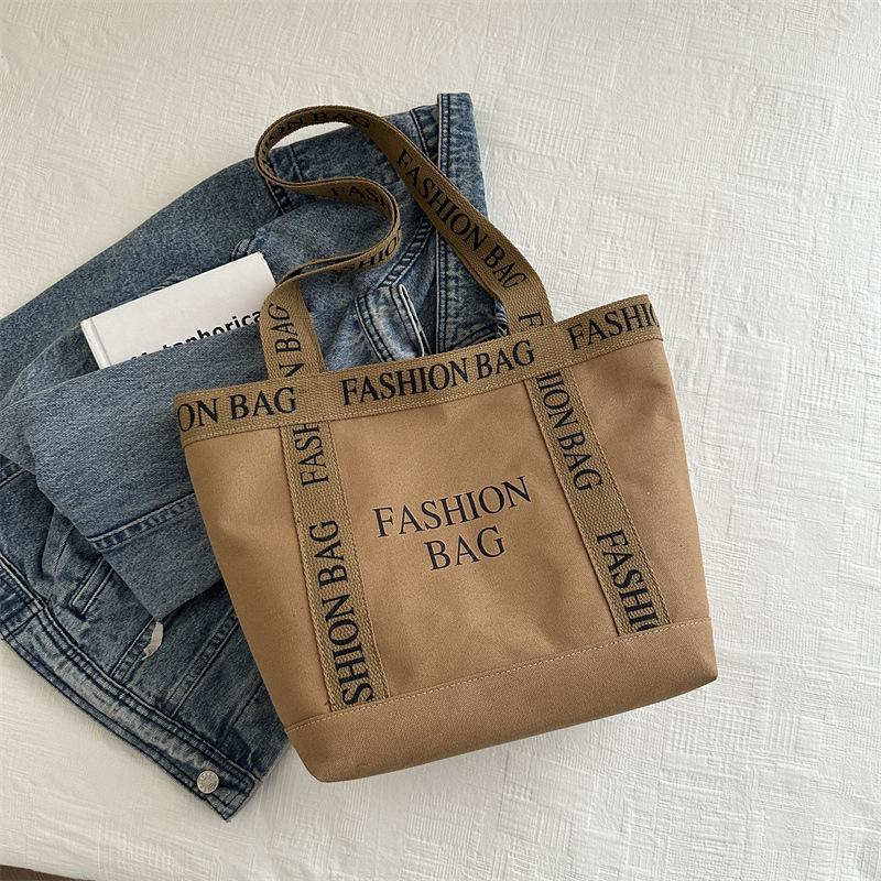 Koreanisches Nischendesign Lässige Schlichte Schultertasche mit großer Kapazität Modische Neue Hochwertige Ein-Schulter-Achsel-Tragetasche