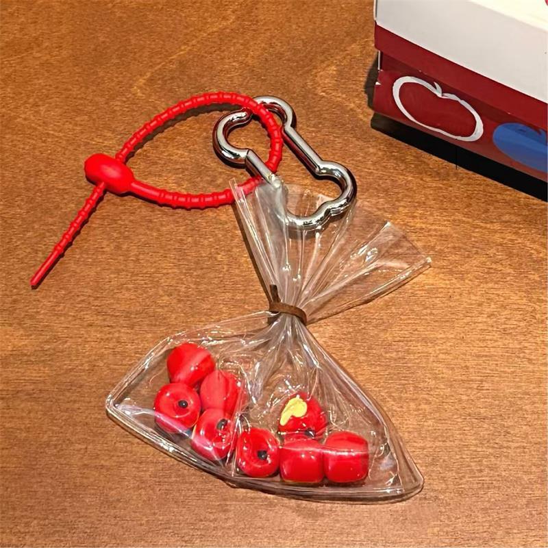 

Creative Cute A Bag Of Apple Core Or Heart Apple Keychain Backpack Pendant Girl Heart Bag Hanging Charm Bone Shaped Keyring Gift