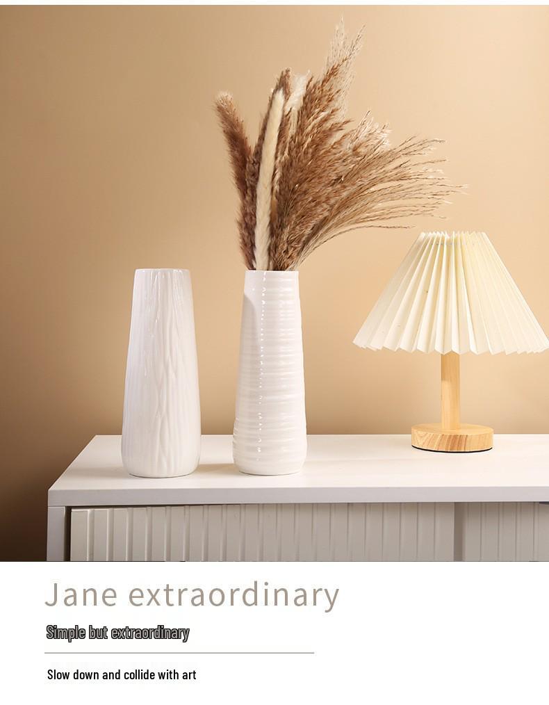 Retro White Ceramic Flower Vase – Creative Ornament for Living Room or Dining Table, Perfect for Hydroponic and Fresh Flowers with a High-End Feel.