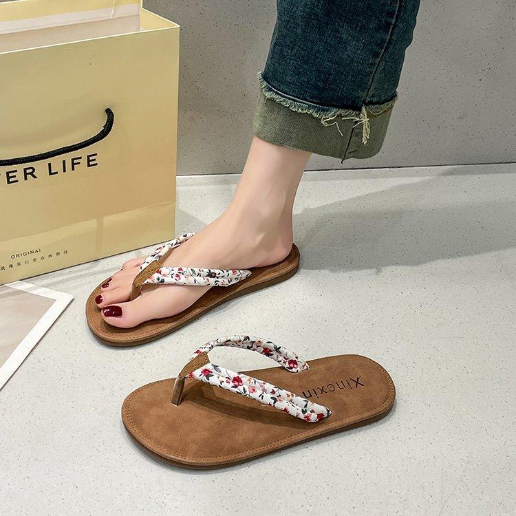 

Интернет знаменитости сандалии шлепанцы женские лето 2024 верхняя одежда плоская подошва отпуск обтягивающие ноги цветочные пляжные туфли женские сандалии побережье 35 белый