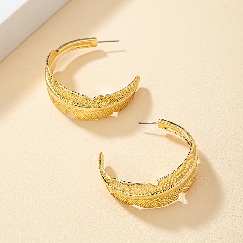 

Geometric C-shaped Leaf Texture Earrings - Minimalist Design Women s Studs