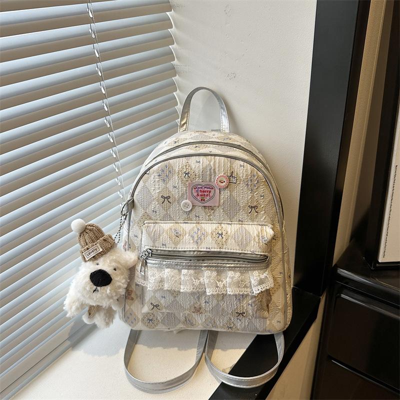 Schoolbag high-end sense large-capacity cartoon backpack bag female 1011 new travel backpack college student class schoolbag
