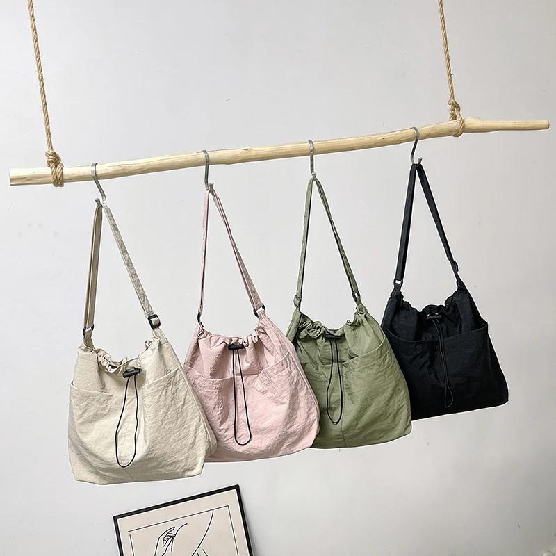 Vysoce kvalitní velkokapacitní nylonová taška na zip jednobarevná všestranná módní měkká jednoduchá taška přes rameno