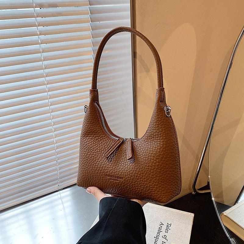 

High sense underarm bag women 2024 new trend fashion dumpling bag Korean version niche design shoulder bag коричневий