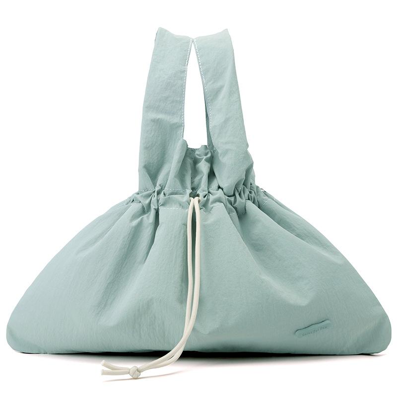 New Women's Retro Bundle Literary and Pastoral Handbag Solid Color Drawstring Commuter Bag