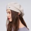 A Women's Beret Knitted Woolen Hat with Autumn and Winter Thick Ear Protection Wool Hat and Shiny Diamond Decoration