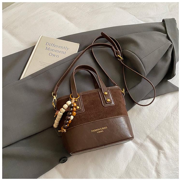Bucket bag women s winter new casual niche simple and exquisite shoulder bag crossbody bag