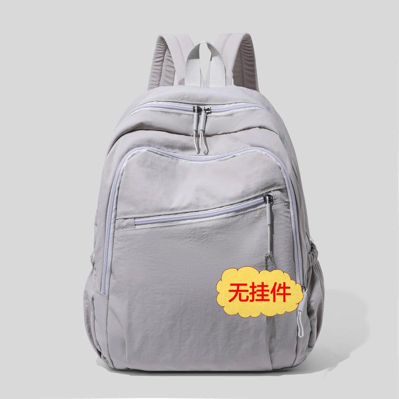 

Оптовый однотонный мягкий легкий рюкзак из чистой ткани нейлон повседневный для поездок на работу легкий водонепроницаемый школьный рюкзак женский рюкзак серый