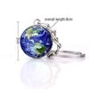 Luminous Solar System Pendant Keychain: Moon, Planets, and Galaxy Glass Ball