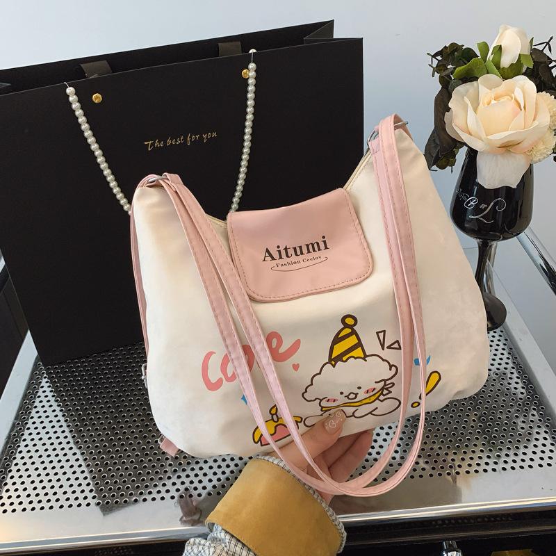 

Cute versatile cartoon print fashion tote bag for women, multi-shoulder commuting casual personalized messenger bag