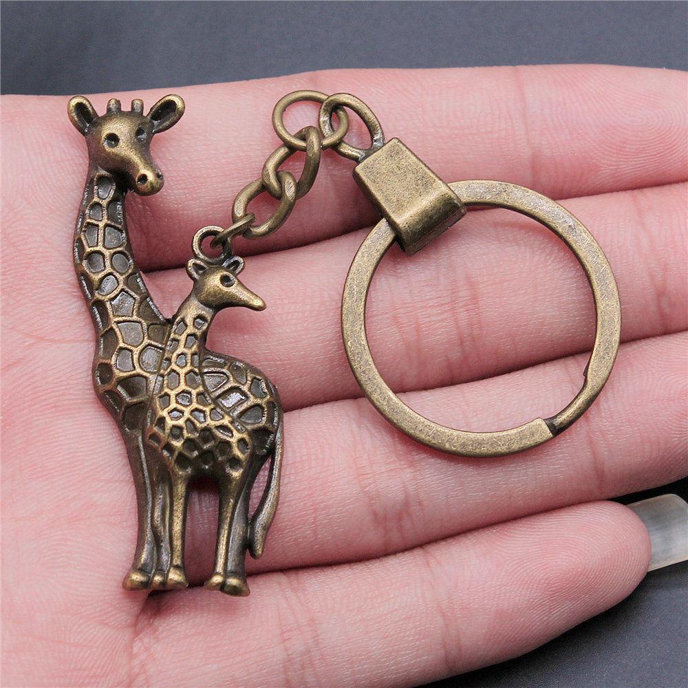 Dinosaur Animal Prehistoric Creature Pendant Antique Bronze Metal Keychain with 30mm Ring for Women High Quality