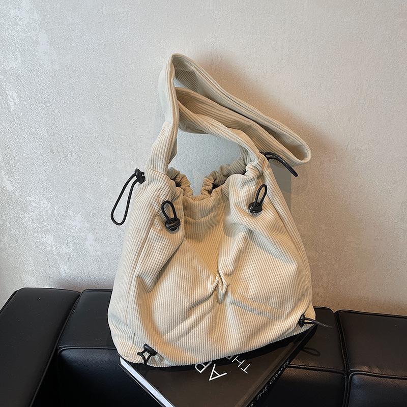 Autumn and Winter New Corduroy Tote Bag Women's Niche Drawstring Design Shoulder Bag Large Capacity Messenger Bag Commuting Versatile