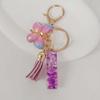 Purple Iridescent Resin Letter Keychain with Butterfly Tassel