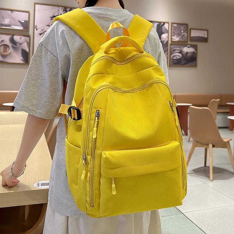 School bag, high-value backpack, casual for junior high school students, simple and light commuting, versatile and large capacity