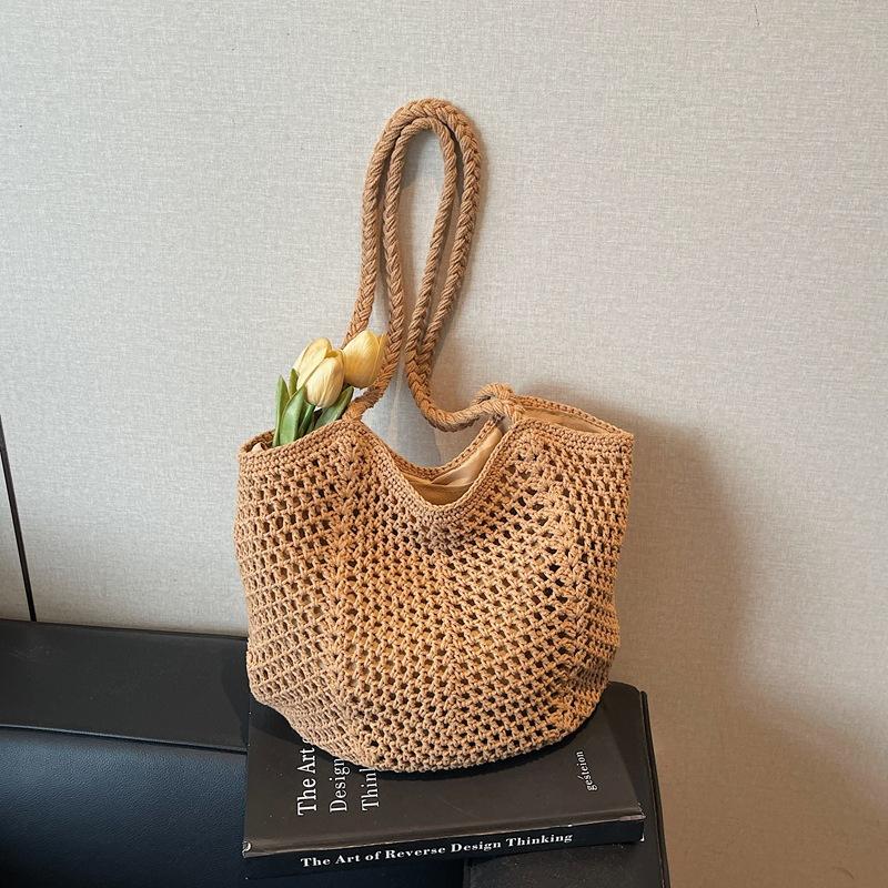 Woven bag women's large-capacity new spring and summer versatile leisure hollow shoulder vacation beach tote bag