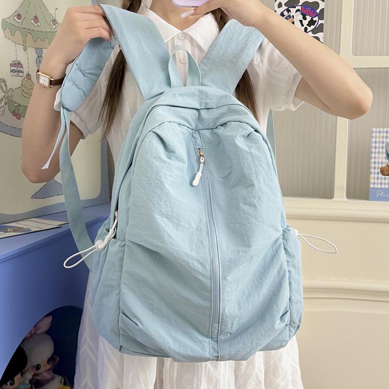 Schoolbag leisure travel backpack simple small fresh student schoolbag niche light solid color backpack spine protection burden reduction