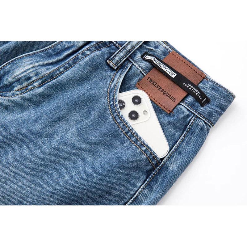 Women's Retro A-Line Denim Skirt: High Waist, Leather Patch, Back Slit, Midi Length for Hip Coverage