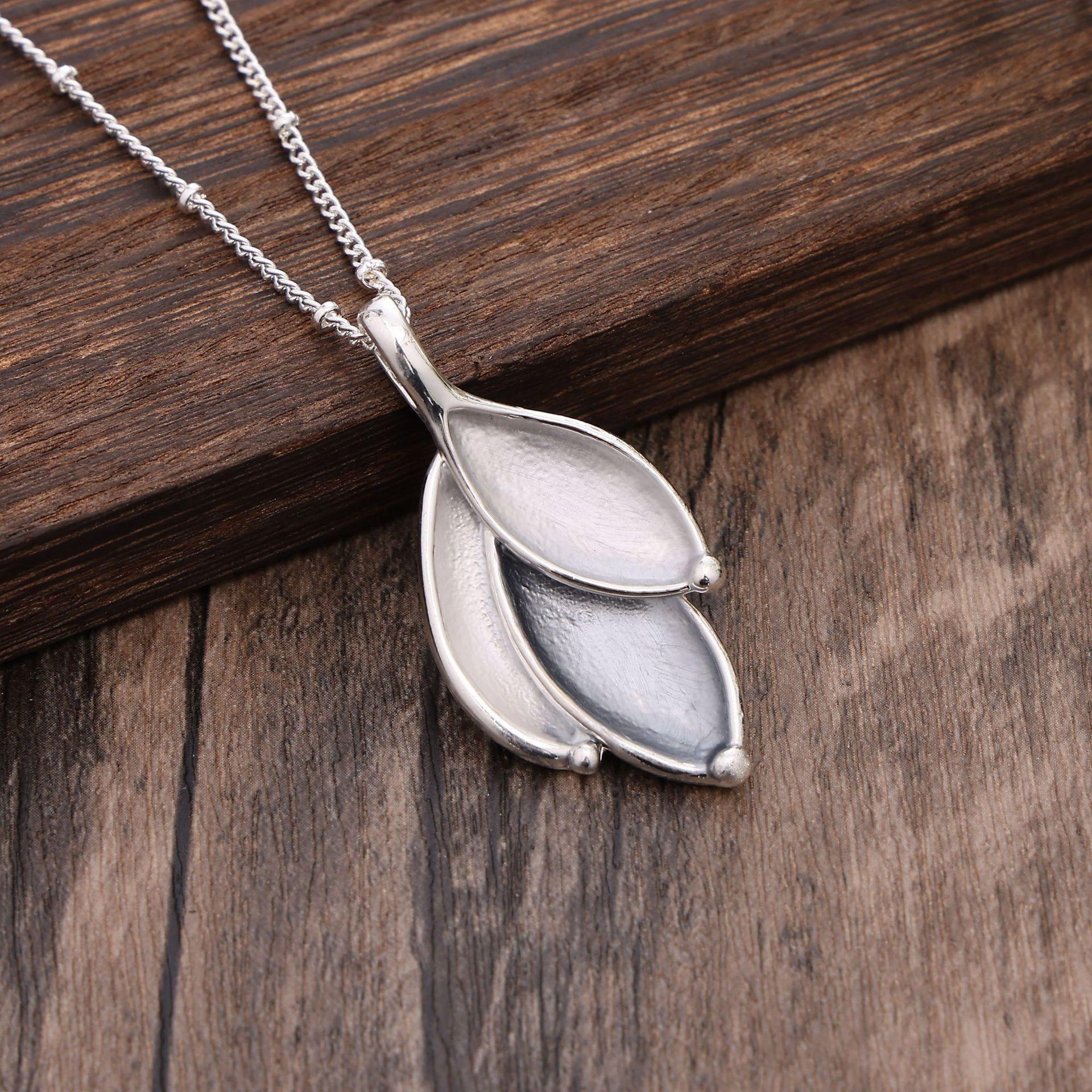 

Новая геометрическая подвеска-лепесток с цветным покрытием, простая, маленькая и свежая женская универсальная подвеска-лист