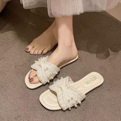 2025 Sommer neue Feen Strand Perle coole Hausschuhe Damen tragen flacher Boden kleiner duftender Stil Ein-Wort-Schlepp ausländischer Stil Explosion