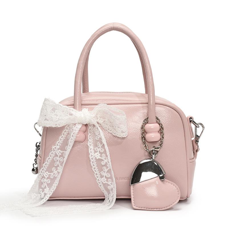 Korean version of the hot sale niche simple solid color hand pillow bag versatile fashion high texture commuter messenger bag women